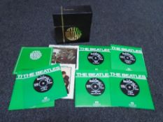 A boxed Beatles collection EMI 45 rpm records