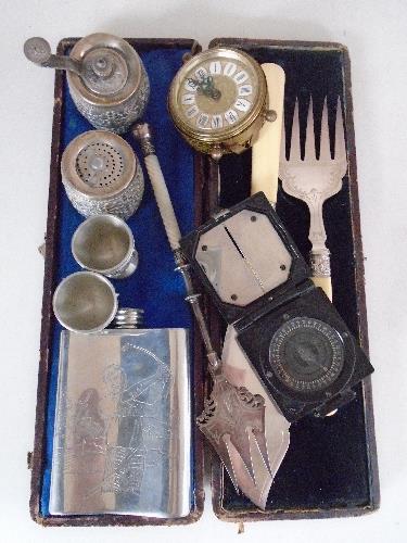 A cased set of fish servers, military pocket compass, bread fork,