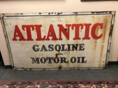 An enamelled metal advertisement sign for Atlantic Gasoline and Motor Oil, 106cm by 182cm.