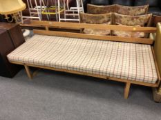 A 20th century Scandinavian pine day bed.