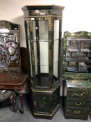 A Japanese lacquered hexagonal display cabinet on stand.