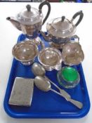 A tray of silver plated four piece tea service,
