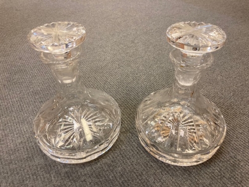Three Stuart Crystal decanters together with a pair of ship's style crystal decanters and three