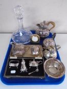 A tray of silver plated cruet set, antique cream jug, Seiko clock, silver plated items,