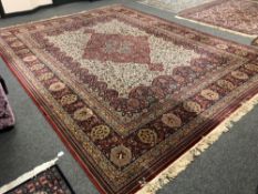 A machine-made Tabriz design carpet,