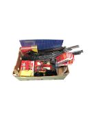 A box containing assorted Hornby accessory packs, crossing barrier,