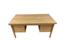 A mid century twin pedestal desk,