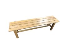 A pine slatted bench,