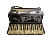 A Soprani Settimio cardinal grand piano accordion