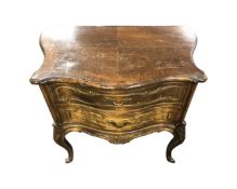 A French carved beech serpentine fronted two drawer chest,
