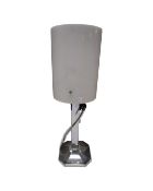 A chrome Art Deco table lamp with shade.