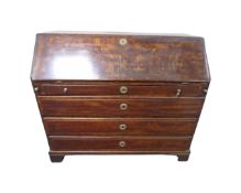 A 19th century oak fall fronted bureau fitted with four drawers,