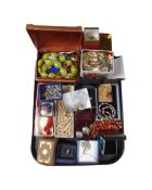 A tray of costume jewellery including Art Deco earrings, pendants on chains,