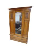 An Edwardian mahogany mirror door wardrobe,