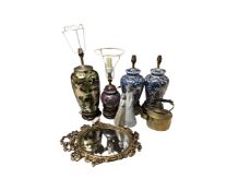 A box of ceramic table lamps, ornate gilt framed mirror, brass spirit kettle,