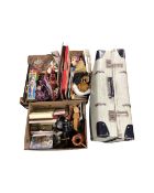 A vintage luggage case together with three boxes containing world dolls, boxed Barbie doll,