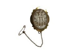 A 9ct yellow gold framed cameo brooch with safety chain, 25 mm x 32 mm.