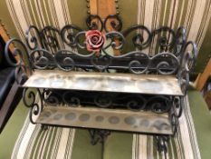 Two wrought iron two tier wall shelves
