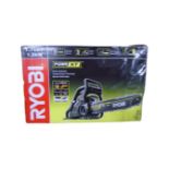 A Ryobi Power XT petrol chain saw,