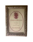 One crate containing fifty six Cameo Collection silver finish 6" x 4" photo frames,