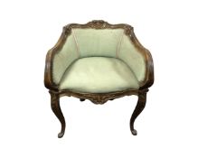 A French carved beech framed dressing table chair in green fabric CONDITION REPORT: