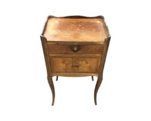 A Victorian style inlaid mahogany bedside cabinet fitted a drawer with gallery,