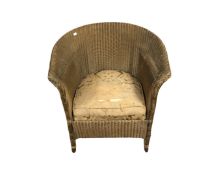 A 20th century gilt Lloyd Loom armchair