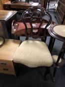 A 19th century occasional chair on cabriole legs