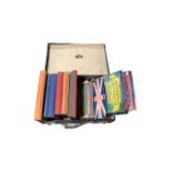 A luggage case containing mid-20th century annuals including Little Friends, Every Girl's book,