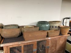 Nine assorted terracotta and ceramic planters and pots