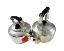 A vintage Swan Brand stainless steel kettle with original tag together with a further stainless