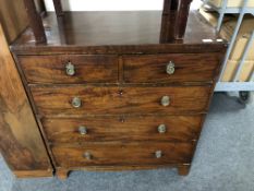 A George III mahogany five drawer chest on chest,