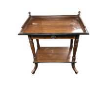 An early 20th century two tier occasional table fitted a drawer,