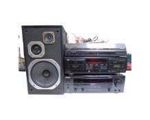 A Kenwood KD-37R automatic return turntable together with a Kenwood KR-V7040 stereo receiver,