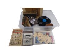A box of vintage books, plated tea pots, 78's, 1950's copy of the Beano, Kensington cigarette silks,