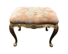 A Louis XV style gilt dressing table stool,