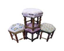 Four continental hexagonal footstools in fabric