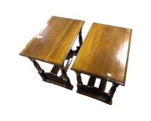 A pair of stained beech lamp tables with under magazine shelf,