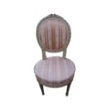 A French style salon bedroom chair in striped fabric