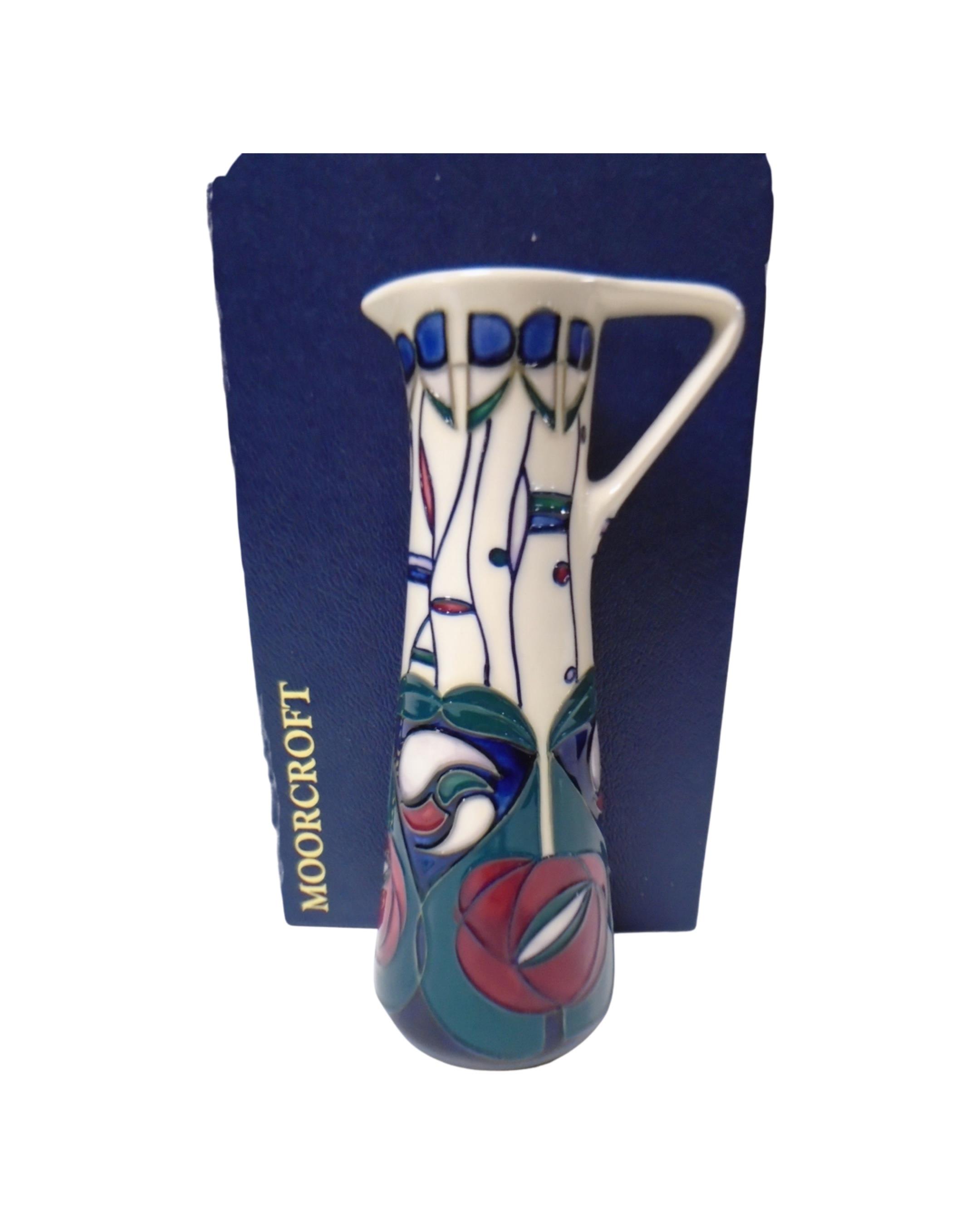 A Moorcroft Arts and Crafts style jug, a tribute to Charles Rennie Mackintosh, boxed.