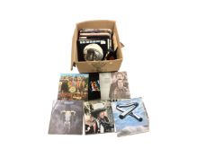 A crate of vinyl LP's including The Beatles, Simon and Garfunkel, Mike Oldfield, Bob Dillon,