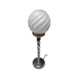 A chrome barley twist Art Deco table lamp with opaque ball shade.