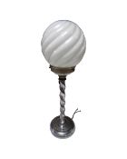 A chrome barley twist Art Deco table lamp with opaque ball shade.