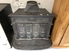 A Novax cast iron log burner,