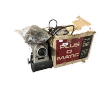 A Plus-o-matic projector boxed together with a further Aldis projector