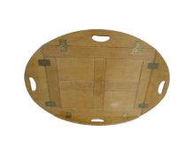 A blond oak butlers tray table top