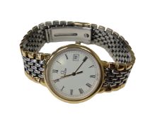 An Omega de Ville lady's stainless steel and gold plated quartz calendar wristwatch, case 30mm,