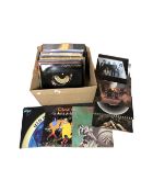 A box containing approximately 38 LPs including Moody Blues, Queen, Magnum, Bill Wyman, Marillion,