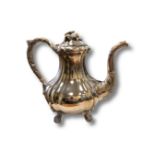 A 19th century Russian silver teapot, stamped 84, height 22cm.