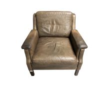 A 1970's Danish armchair in brown leather
